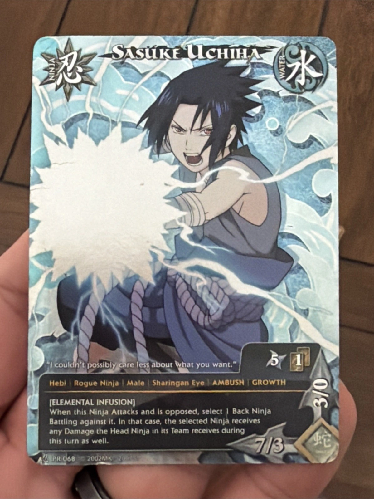 Sasuke Uchiha PR068 · Shonen Jump, Mai 2011. Foto des ungegradeten Exemplars im abgeschlossenen Angebot.